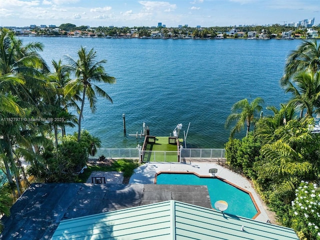 1375 N Biscayne Point Rd, Miami Beach, FL 33141 - outdoor pool featuring a water view and a fenced backyard