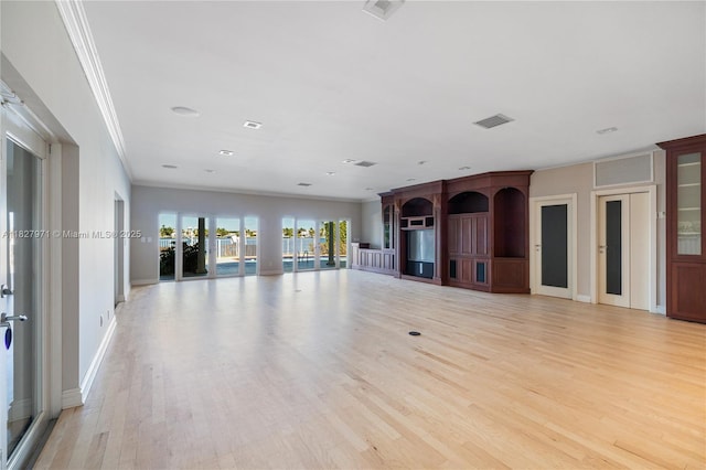 1375 N Biscayne Point Rd, Miami Beach, FL 33141 - unfurnished living room featuring light wood finished floors and crown molding