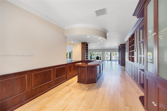 1375 N Biscayne Point Rd, Miami Beach, FL 33141 - bar area featuring light wood-style floors, crown molding, and recessed lighting