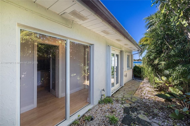 1375 N Biscayne Point Rd, Miami Beach, FL 33141 - view of side of property with stucco siding