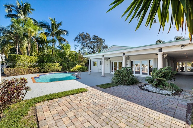 1375 N Biscayne Point Rd, Miami Beach, FL 33141 - view of swimming pool featuring french doors and a patio