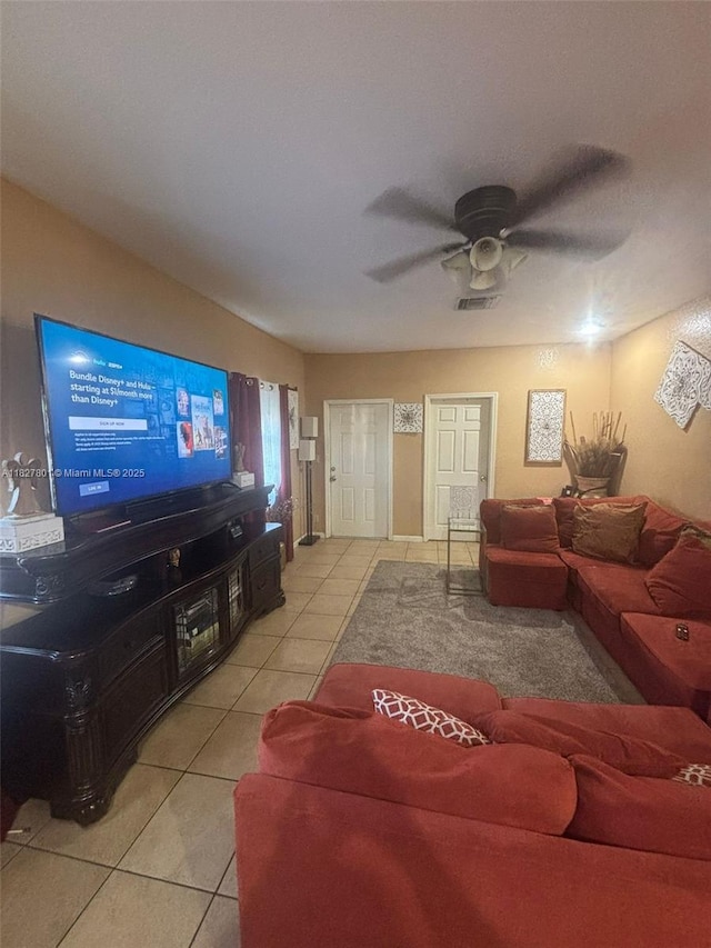 330 N Deerfield Ave, Deerfield Beach, FL 33441 - living room with light tile patterned floors and a ceiling fan