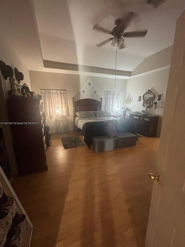 330 N Deerfield Ave, Deerfield Beach, FL 33441 - bedroom featuring wood finished floors, lofted ceiling, and a ceiling fan