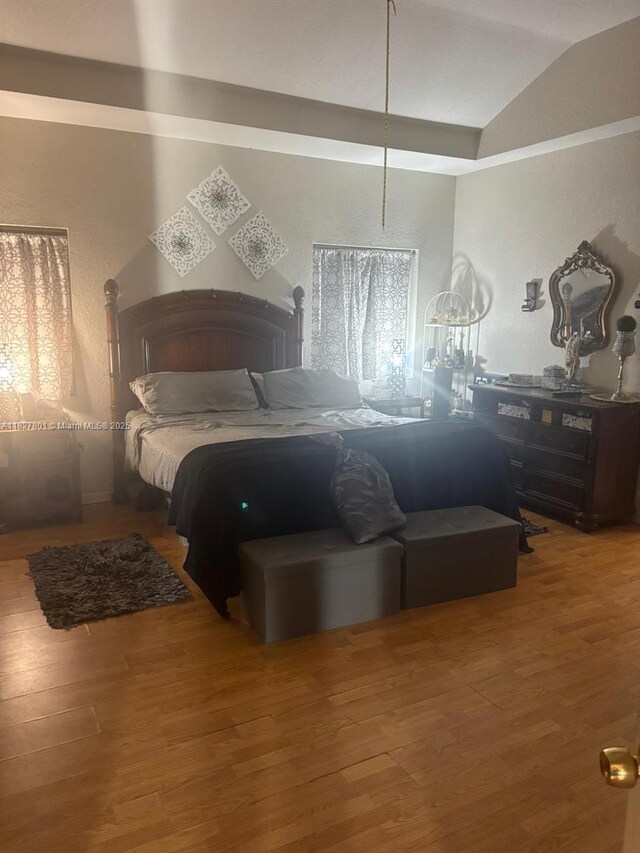 330 N Deerfield Ave, Deerfield Beach, FL 33441 - bedroom with wood finished floors and lofted ceiling
