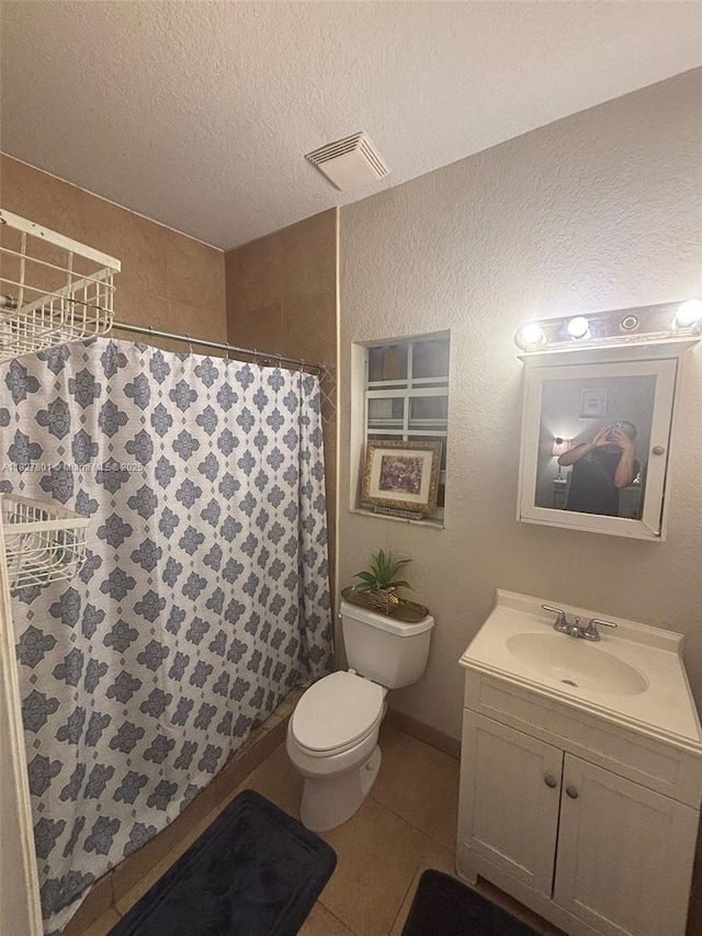 330 N Deerfield Ave, Deerfield Beach, FL 33441 - bathroom with vanity, tile patterned flooring, a shower with curtain, and a textured ceiling
