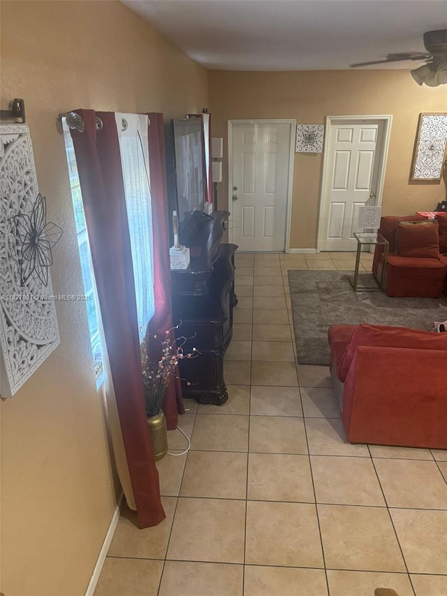 330 N Deerfield Ave, Deerfield Beach, FL 33441 - living room with light tile patterned floors and ceiling fan