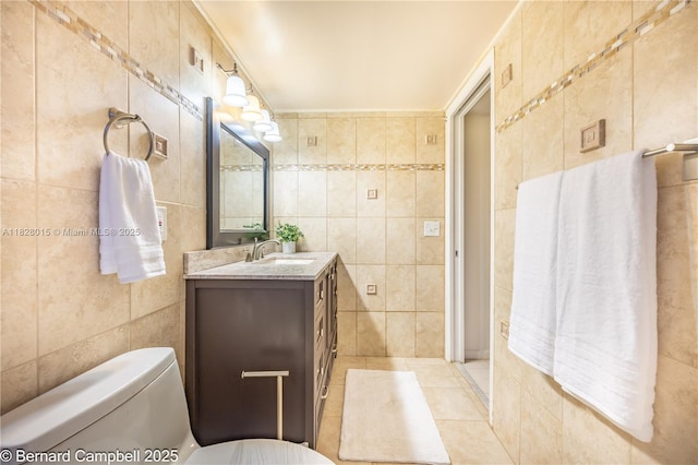 3021 Ventnor H Unit 3021, Deerfield Beach, FL 33442 - bathroom with tile walls, vanity, and tile patterned flooring