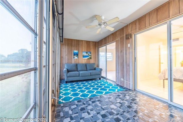 3021 Ventnor H Unit 3021, Deerfield Beach, FL 33442 - sunroom / solarium with wood walls and a ceiling fan