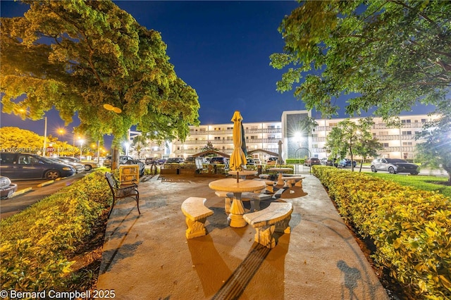 3021 Ventnor H Unit 3021, Deerfield Beach, FL 33442 - view of patio at night