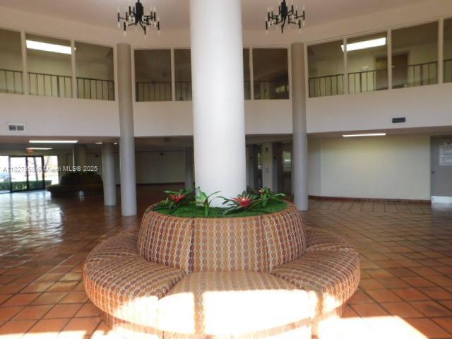 5900 SW 127th Ave Unit 3304, Miami, FL 33183 - building lobby with a high ceiling