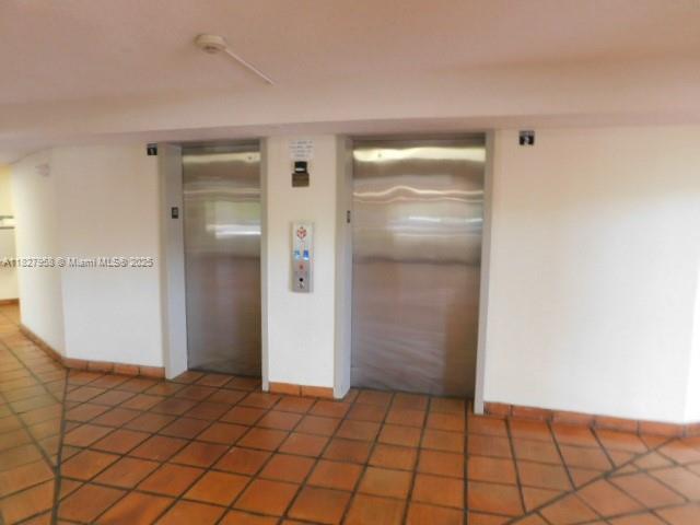 5900 SW 127th Ave Unit 3304, Miami, FL 33183 - spare room with elevator