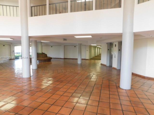 5900 SW 127th Ave Unit 3304, Miami, FL 33183 - community lobby featuring a high ceiling