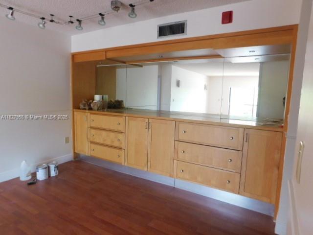 5900 SW 127th Ave Unit 3304, Miami, FL 33183 - kitchen featuring light brown cabinetry, dark wood-type flooring, and a peninsula