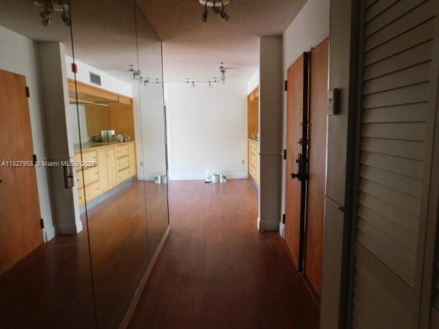 5900 SW 127th Ave Unit 3304, Miami, FL 33183 - hall with wood finished floors and baseboards