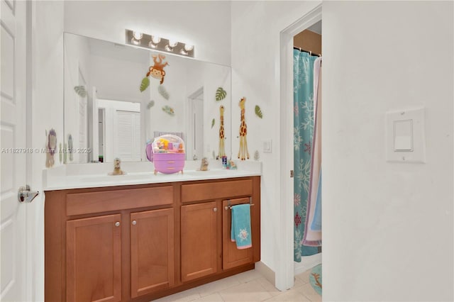 17709 SW 150th Ct, Miami, FL 33187 - full bathroom featuring double vanity, tile patterned floors, and a shower with shower curtain