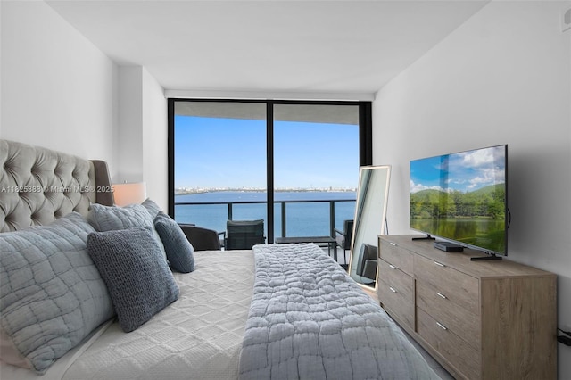 460 NE 28th St Unit 2407, Miami, FL 33137 - bedroom featuring expansive windows and multiple windows