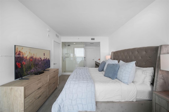 460 NE 28th St Unit 2407, Miami, FL 33137 - bedroom with wood finished floors and ensuite bathroom