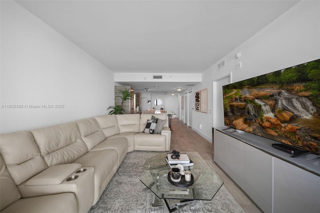 460 NE 28th St Unit 2407, Miami, FL 33137 - living area featuring light wood-style flooring and baseboards