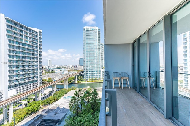 88 SW 7th St Unit 1008, Miami, FL 33130 - balcony featuring a view of city and a water view
