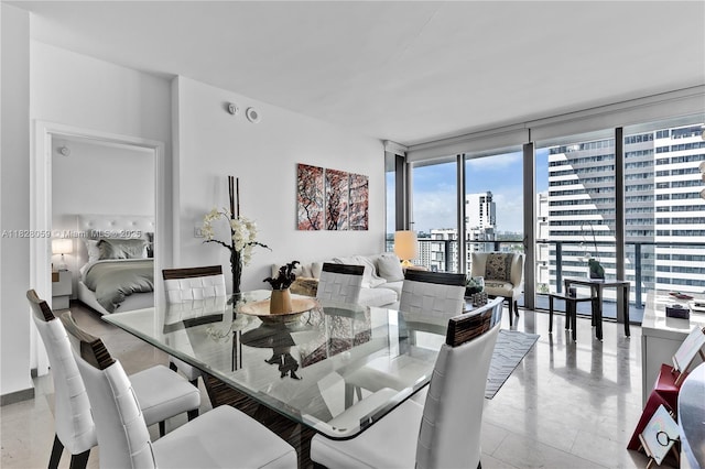 88 SW 7th St Unit 1008, Miami, FL 33130 - dining space with floor to ceiling windows and a city view