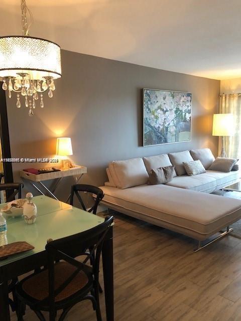 400 Kings Point Dr Unit 820, Sunny Isles Beach, FL 33160 - living room with wood finished floors