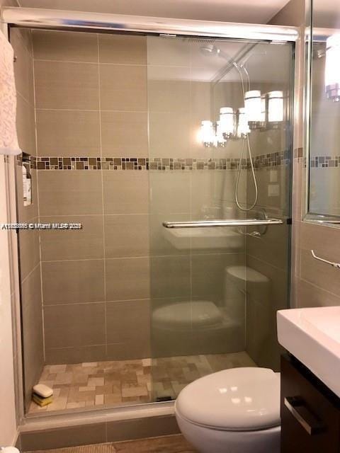 400 Kings Point Dr Unit 820, Sunny Isles Beach, FL 33160 - bathroom with a stall shower and vanity