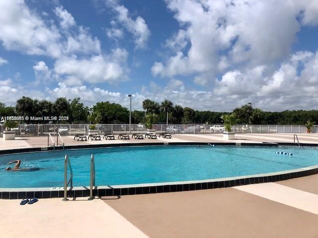 400 Kings Point Dr Unit 820, Sunny Isles Beach, FL 33160 - community pool featuring a patio area