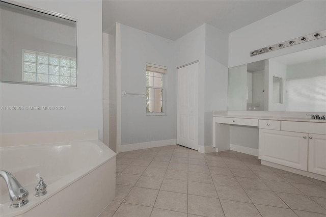 3843 Oak Ridge Cir, Weston, FL 33331 - bathroom featuring vanity, a bath, and tile patterned floors