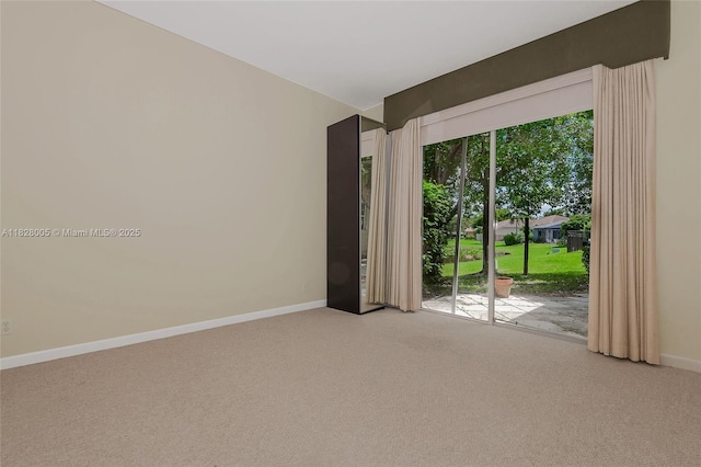 3843 Oak Ridge Cir, Weston, FL 33331 - carpeted empty room with baseboards