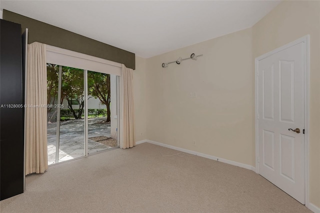 3843 Oak Ridge Cir, Weston, FL 33331 - carpeted empty room with baseboards