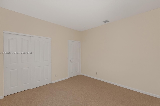 3843 Oak Ridge Cir, Weston, FL 33331 - unfurnished bedroom featuring light carpet and a closet