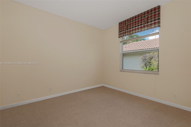 3843 Oak Ridge Cir, Weston, FL 33331 - carpeted spare room featuring baseboards
