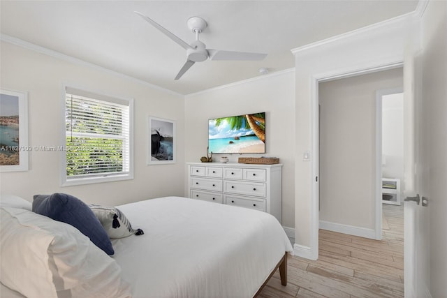 228 Rutland Blvd, West Palm Beach, FL 33405 - bedroom with ornamental molding, light wood finished floors, and a ceiling fan