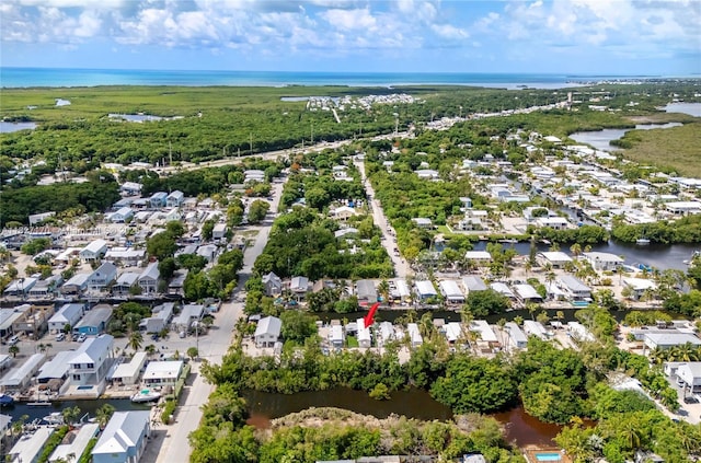 456 Bowie Ln, Key Largo, FL 33037 - aerial view of property and surrounding area featuring a nearby body of water and nearby suburban area
