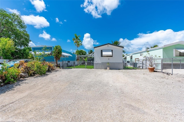 456 Bowie Ln, Key Largo, FL 33037 - rear view of house with a residential view
