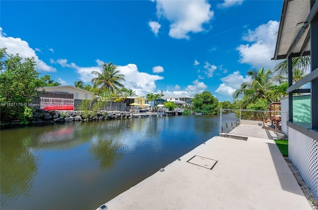 456 Bowie Ln, Key Largo, FL 33037 - dock area featuring a water view and a patio