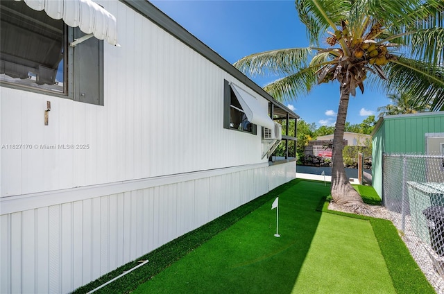 456 Bowie Ln, Key Largo, FL 33037 - view of yard with an area to practice putting