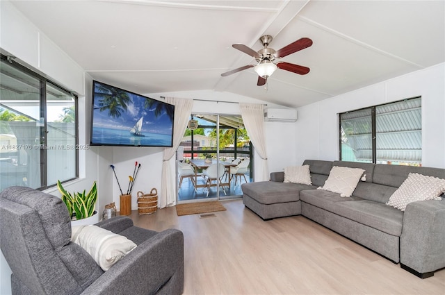 456 Bowie Ln, Key Largo, FL 33037 - living room with light wood-type flooring, ceiling fan, and a wall unit AC