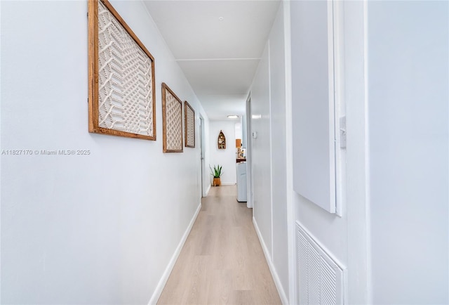 456 Bowie Ln, Key Largo, FL 33037 - corridor featuring light wood-style flooring and baseboards