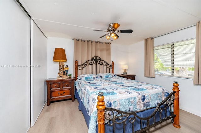 456 Bowie Ln, Key Largo, FL 33037 - bedroom featuring light wood-style floors and a ceiling fan