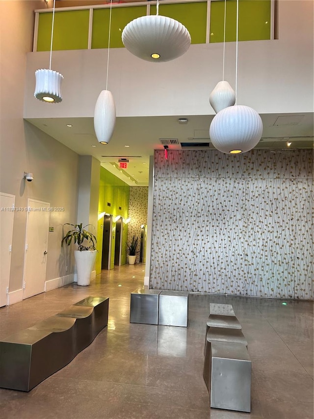 133 NE 2nd Ave Unit 815, Miami, FL 33132 - common area with a towering ceiling
