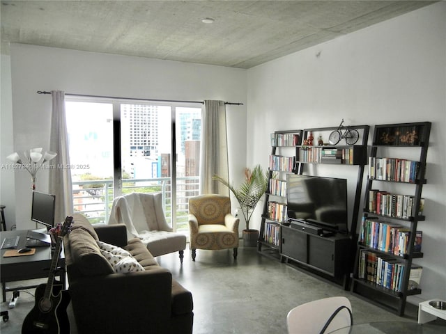133 NE 2nd Ave Unit 815, Miami, FL 33132 - living room featuring finished concrete floors