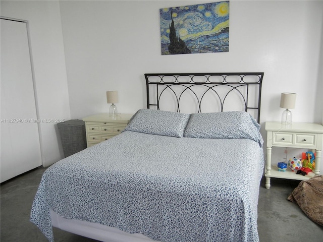 133 NE 2nd Ave Unit 815, Miami, FL 33132 - bedroom featuring finished concrete floors