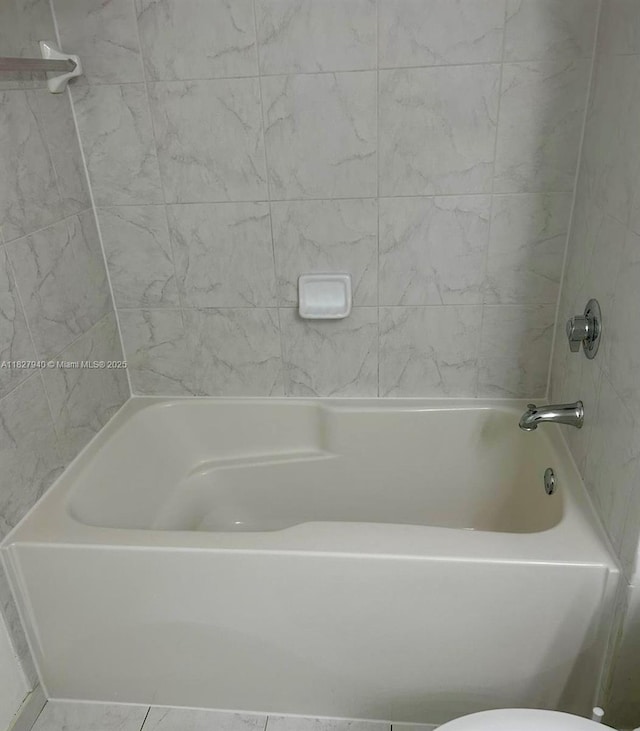 133 NE 2nd Ave Unit 815, Miami, FL 33132 - full bath featuring toilet and a tub to relax in