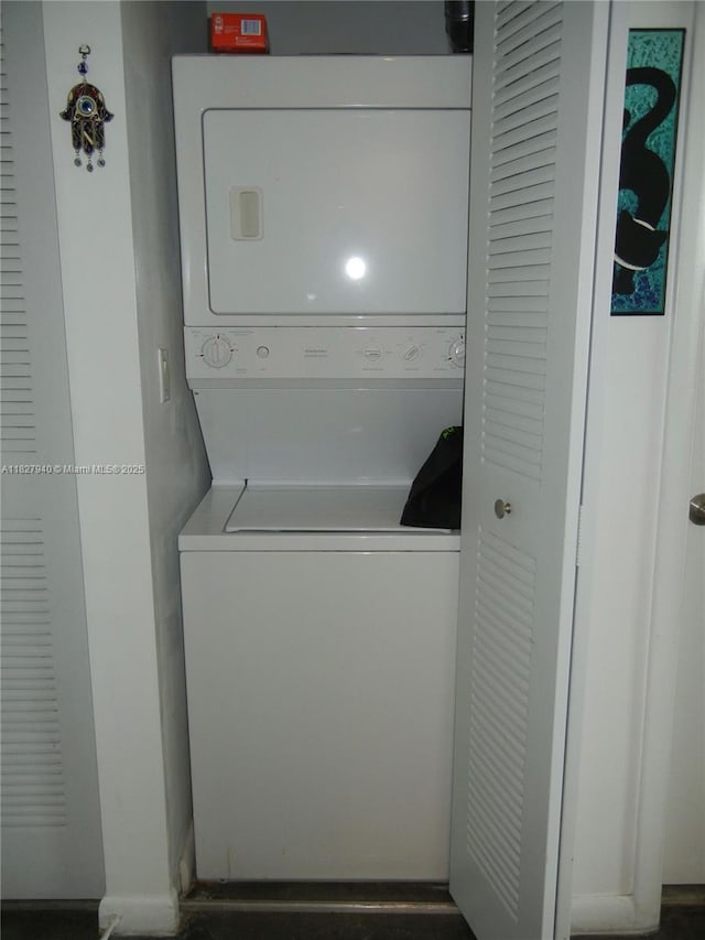 133 NE 2nd Ave Unit 815, Miami, FL 33132 - laundry room featuring stacked washer / drying machine