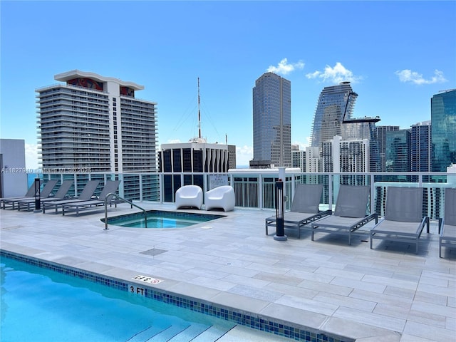 133 NE 2nd Ave Unit 815, Miami, FL 33132 - community pool with a community hot tub, a patio area, and a city view