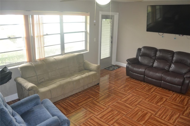 56 Norwich C Unit 56, West Palm Beach, FL 33417 - living room featuring baseboards