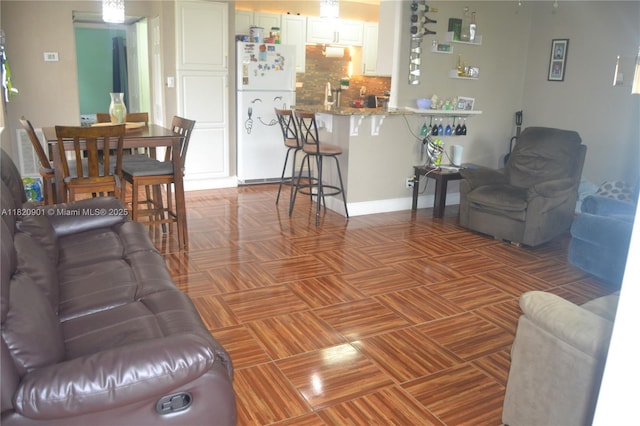 56 Norwich C Unit 56, West Palm Beach, FL 33417 - living room with baseboards