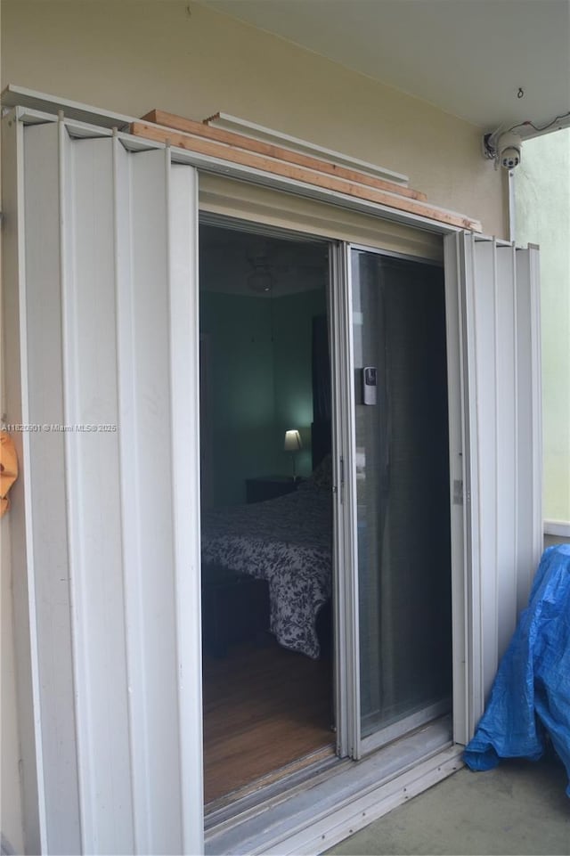 56 Norwich C Unit 56, West Palm Beach, FL 33417 - doorway to property with stucco siding