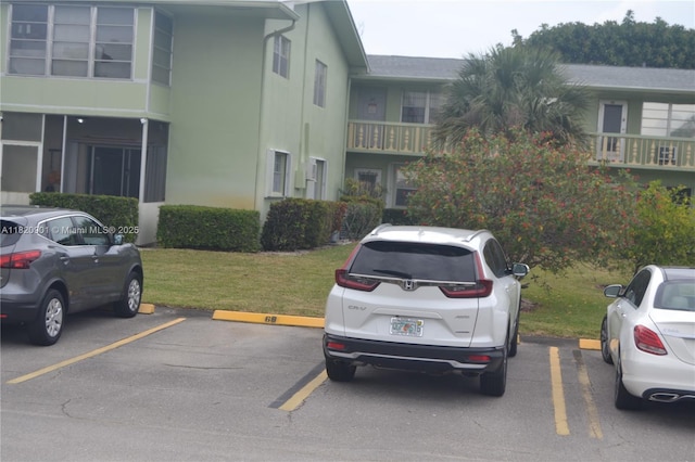 56 Norwich C Unit 56, West Palm Beach, FL 33417 - view of uncovered parking lot